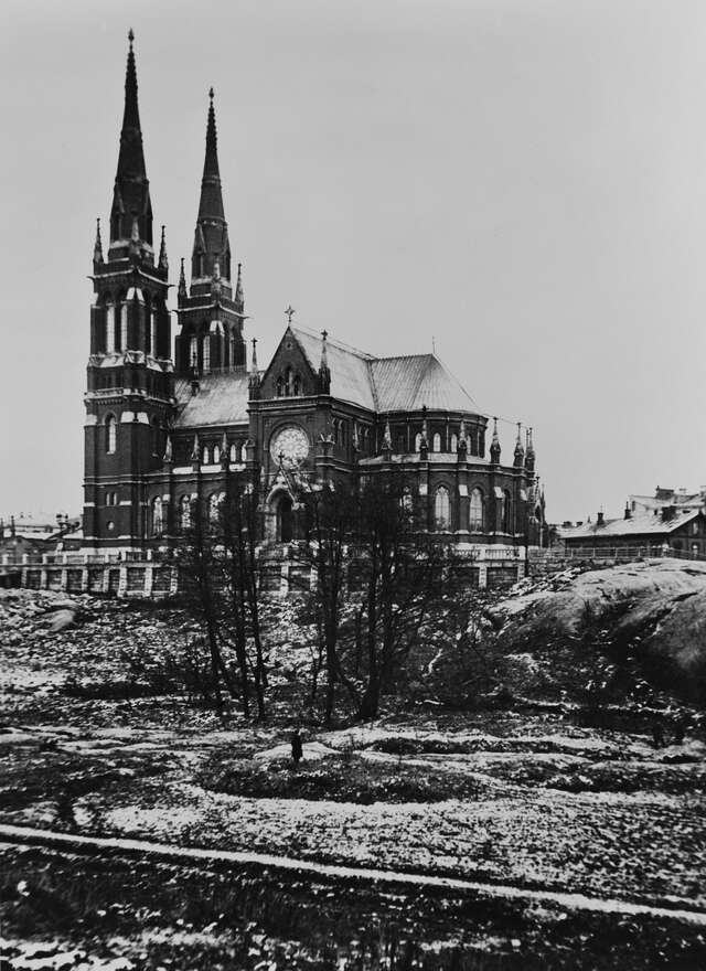 Black and white photograph of the church with unbuilt ground