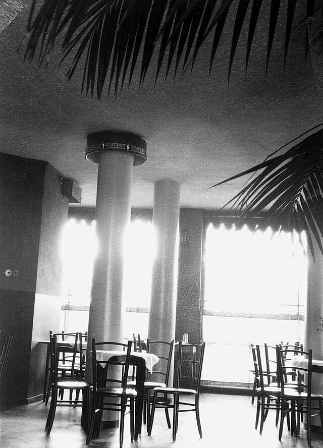 restaurant space with two columns in black and white