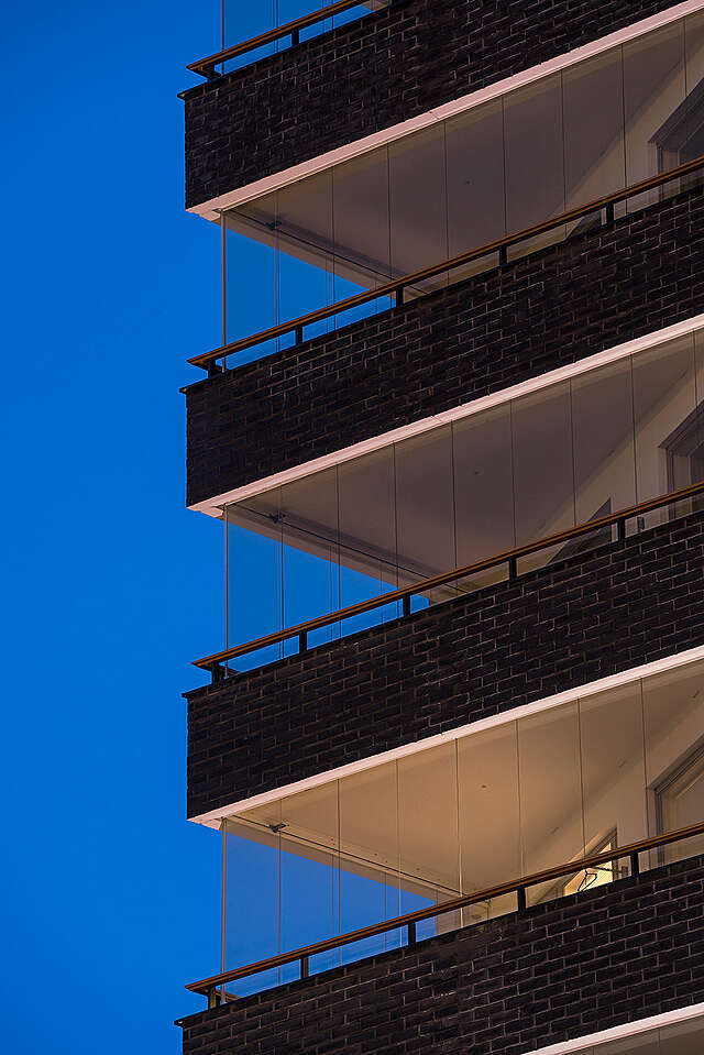 Triangular glazed balconies.