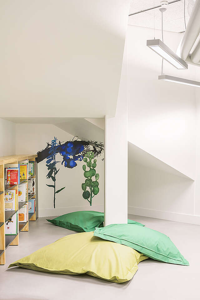 Reading nook below the stairs.