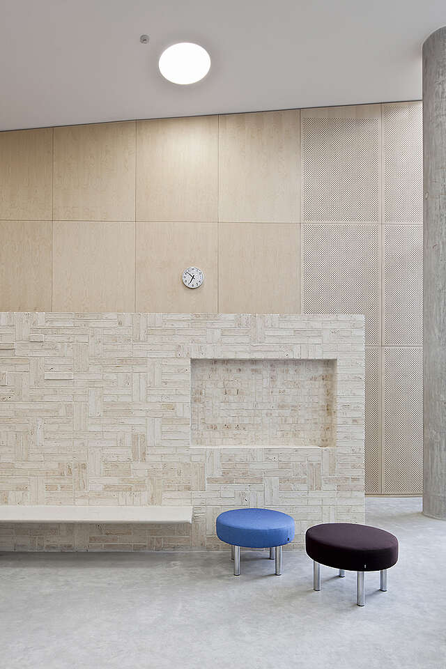 Space with concrete, stone and wood elements.